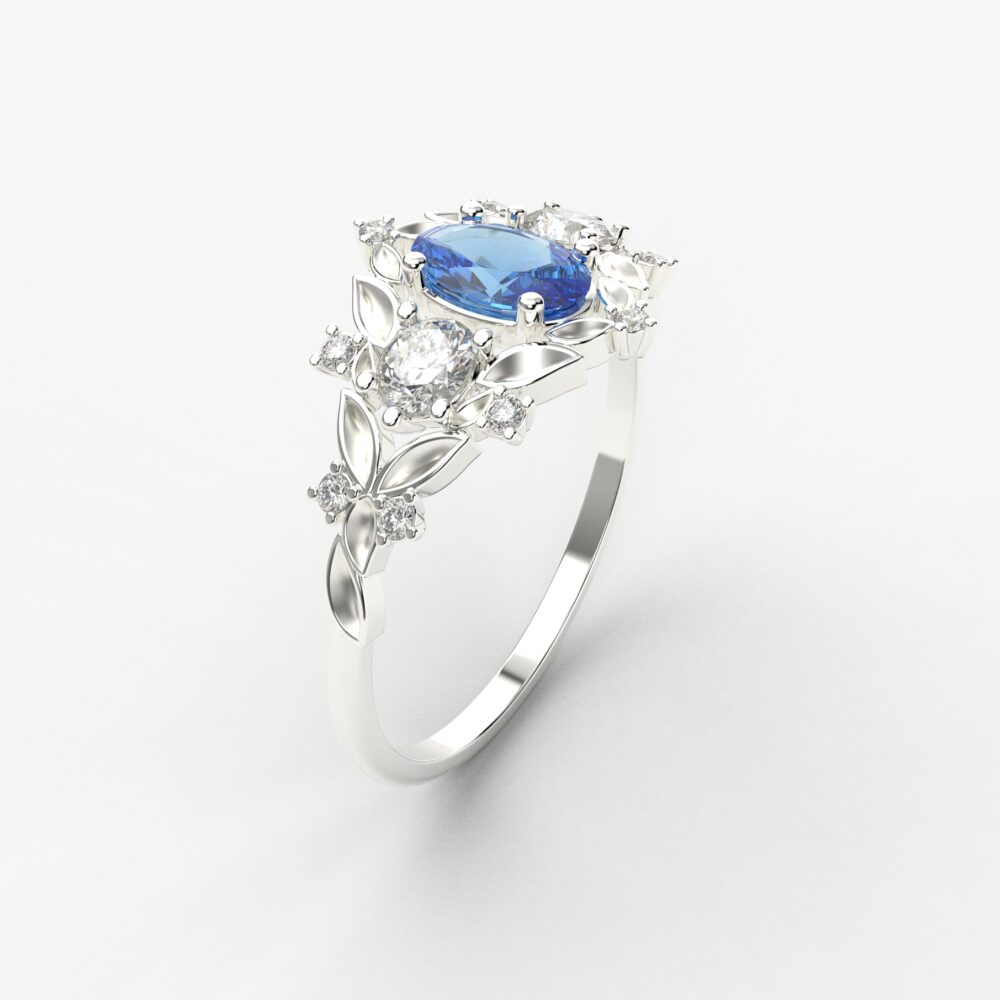 Prsten model 100 od belog zlata sa safirom i brilijantima