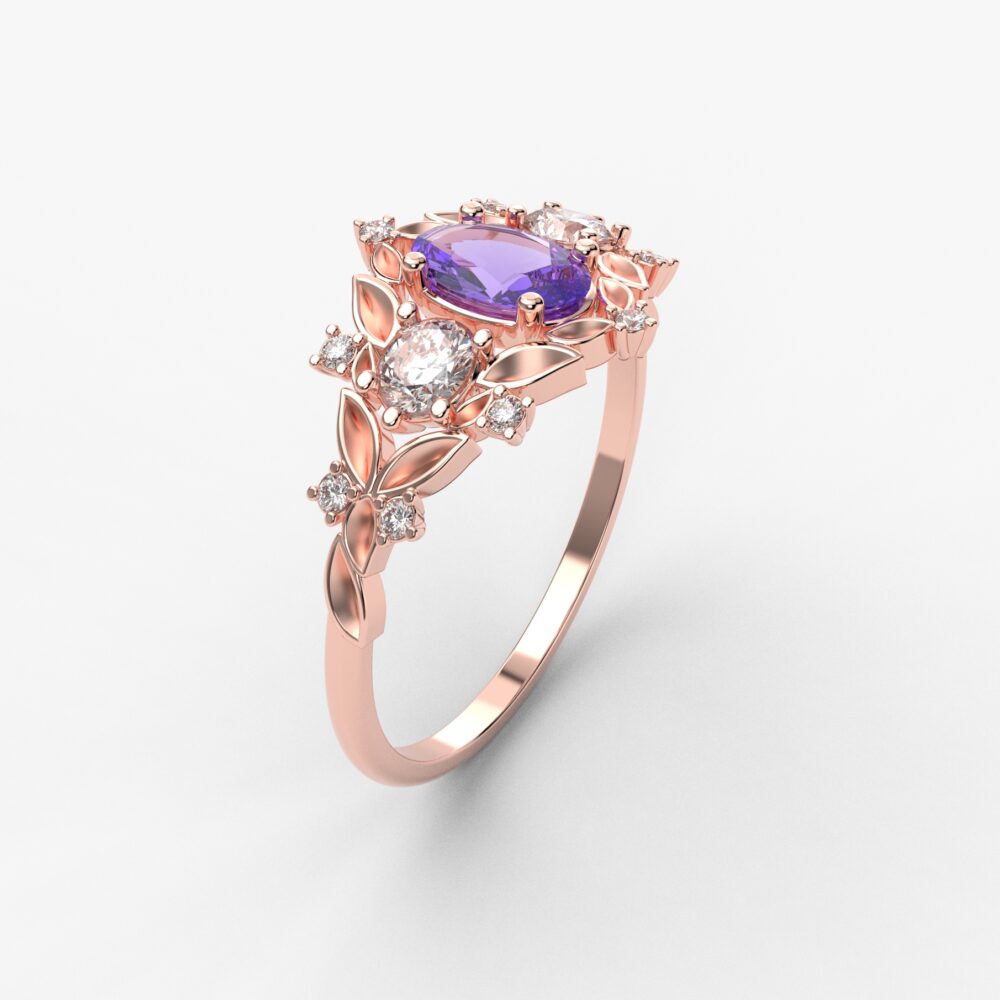 Prsten model 100 od roze zlata sa tanzanitom i cirkonima