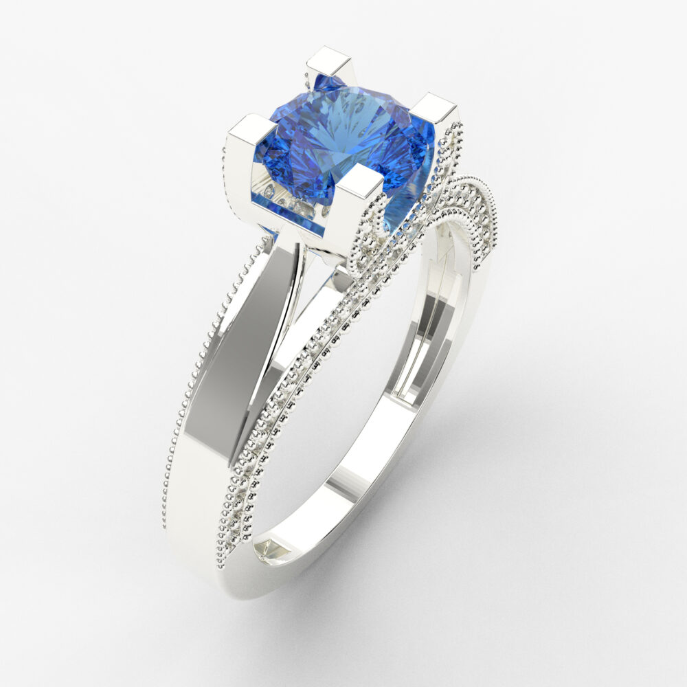 Prsten model 21 od belog zlata sa safirom i brilijantima