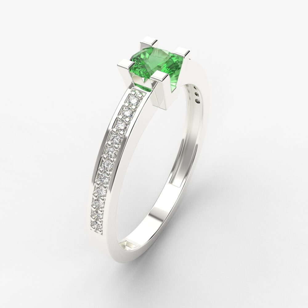 Prsten model 31 od belog zlata sa smaragdom i brilijantima