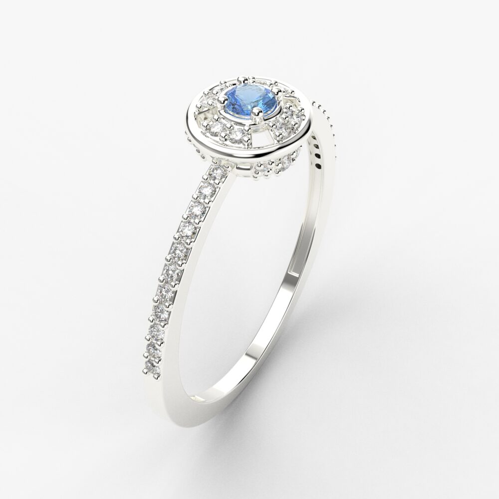 Prsten model 36 od belog zlata sa plavim topazom i brilijantima
