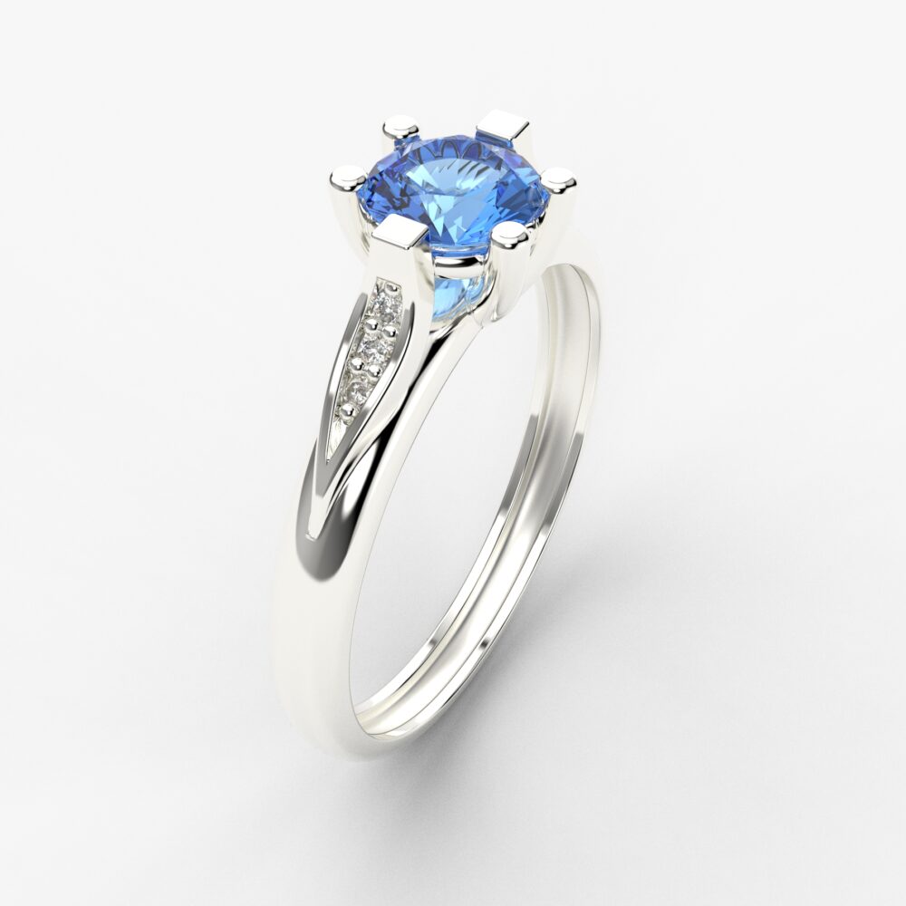 Prsten model 55 od belog zlata sa plavim topazom i cirkonima