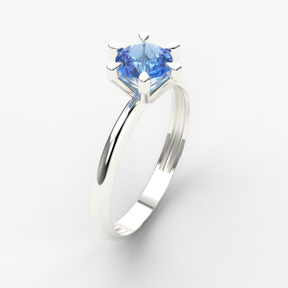 Prsten model 56 od belog zlata sa plavim topazom