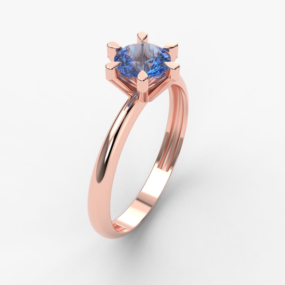 Prsten model 56 od roze zlata sa plavim topazom