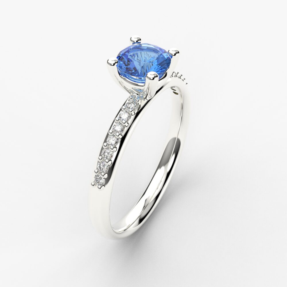 Prsten model 57 od belog zlata sa plavim topazom i cirkonima
