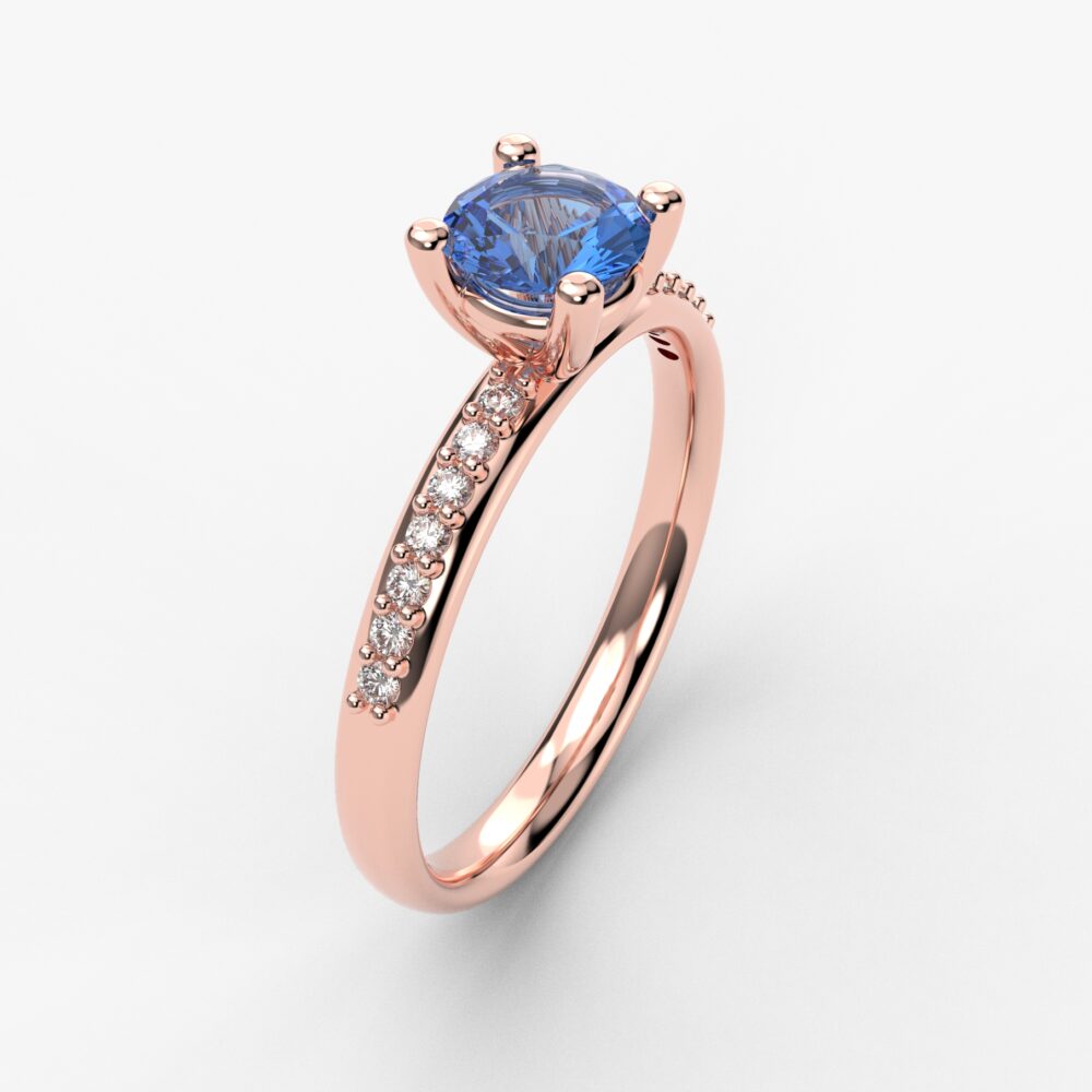 Prsten model 57 od roze zlata sa plavim topazom i brilijantima