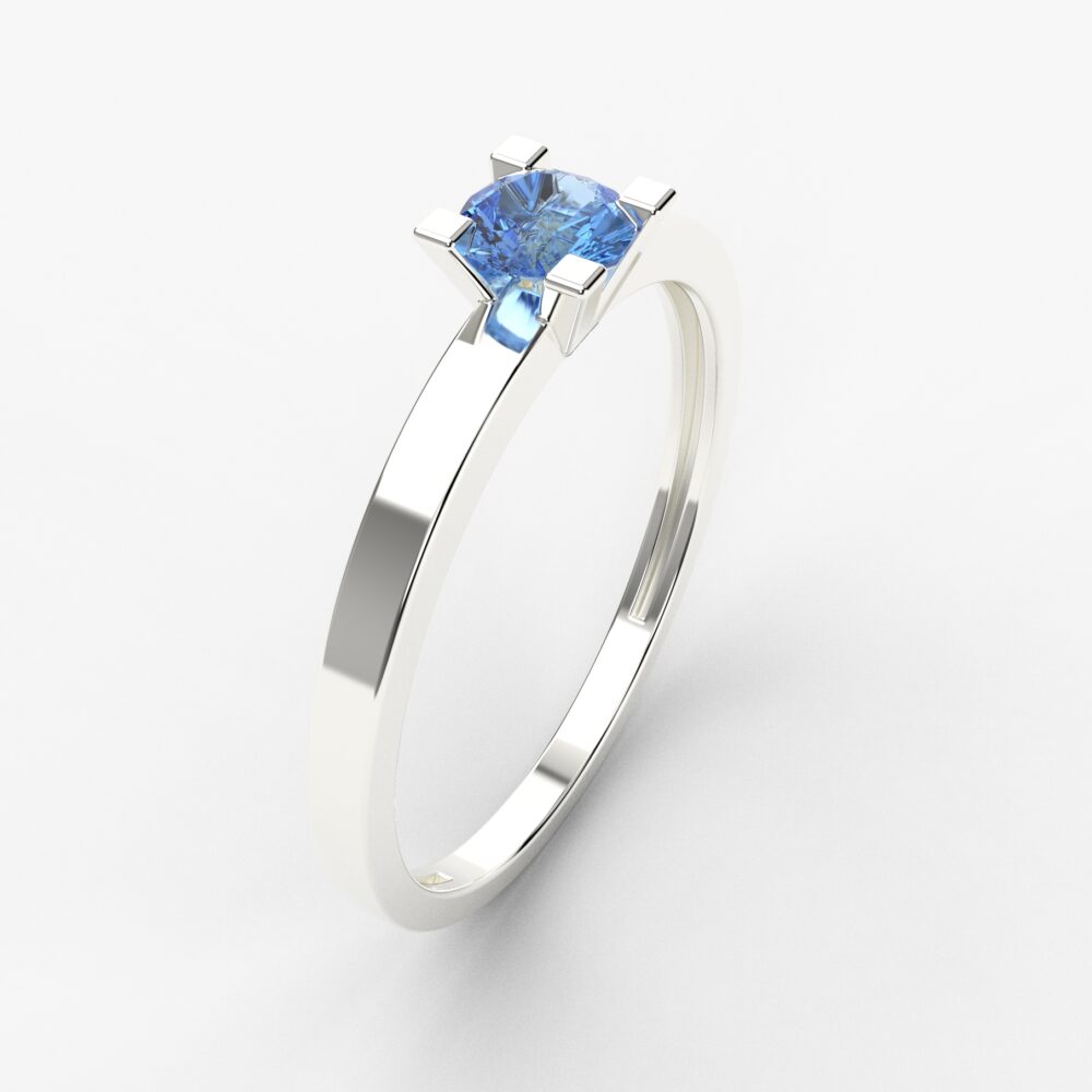 Prsten model 62 od belog zlata sa plavim topazom