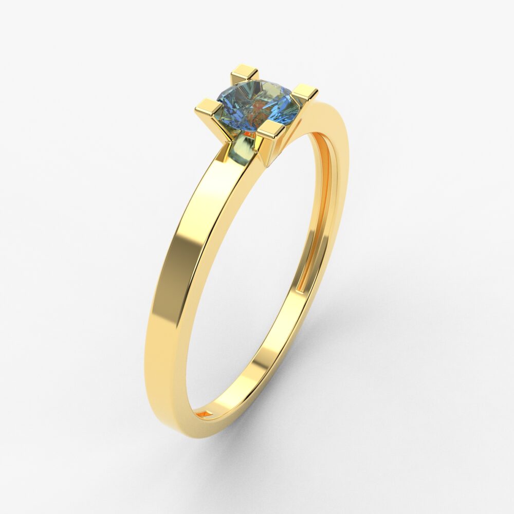Prsten model 62 od žutog zlata sa plavim topazom