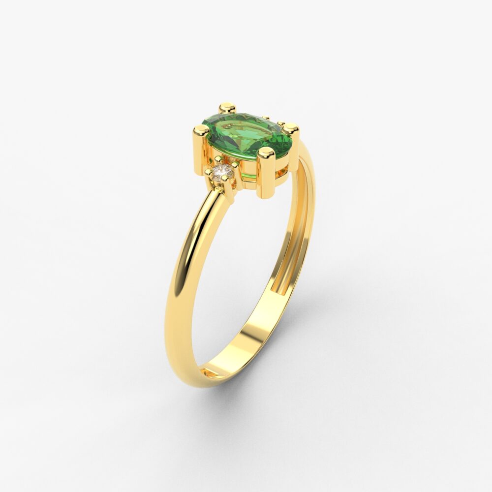 Prsten model 64 od žutog zlata sa smaragdom i brilijantima