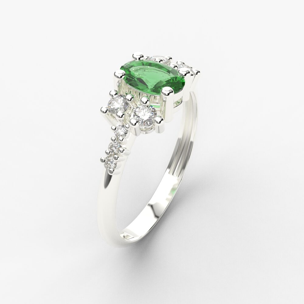 Prsten model 65 od belog zlata sa smaragdom i cirkonima