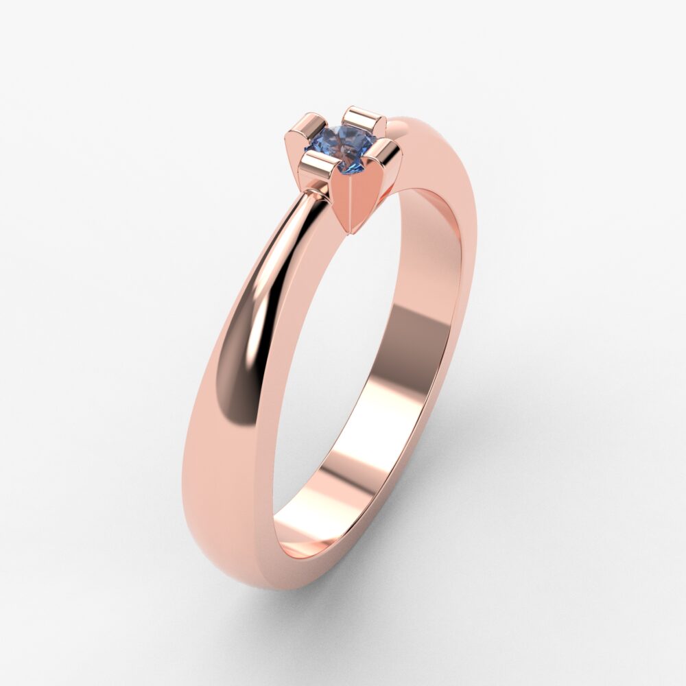 Prsten model 66 od roze zlata sa plavim topazom