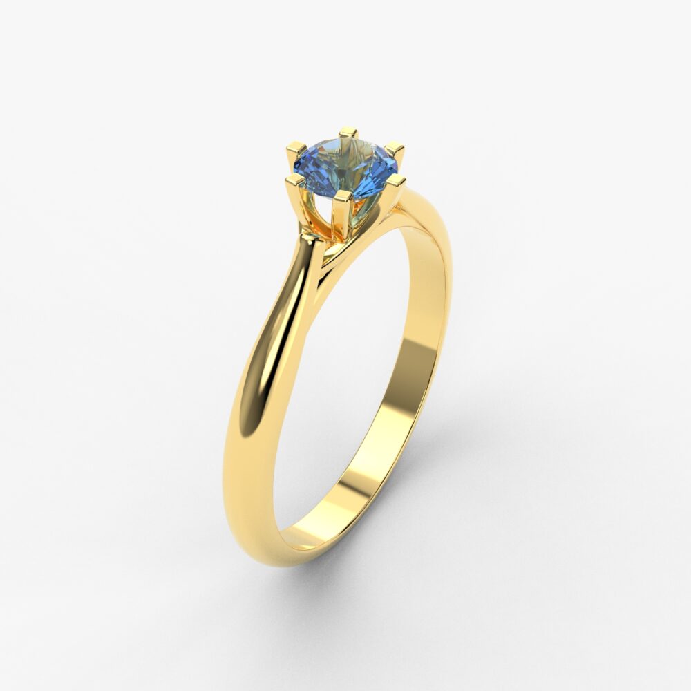Prsten model 85 od žutog zlata sa plavim topazom