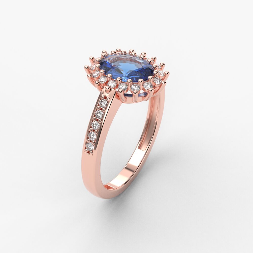 Prsten model 89 od roze zlata sa plavim topazom i brilijantima