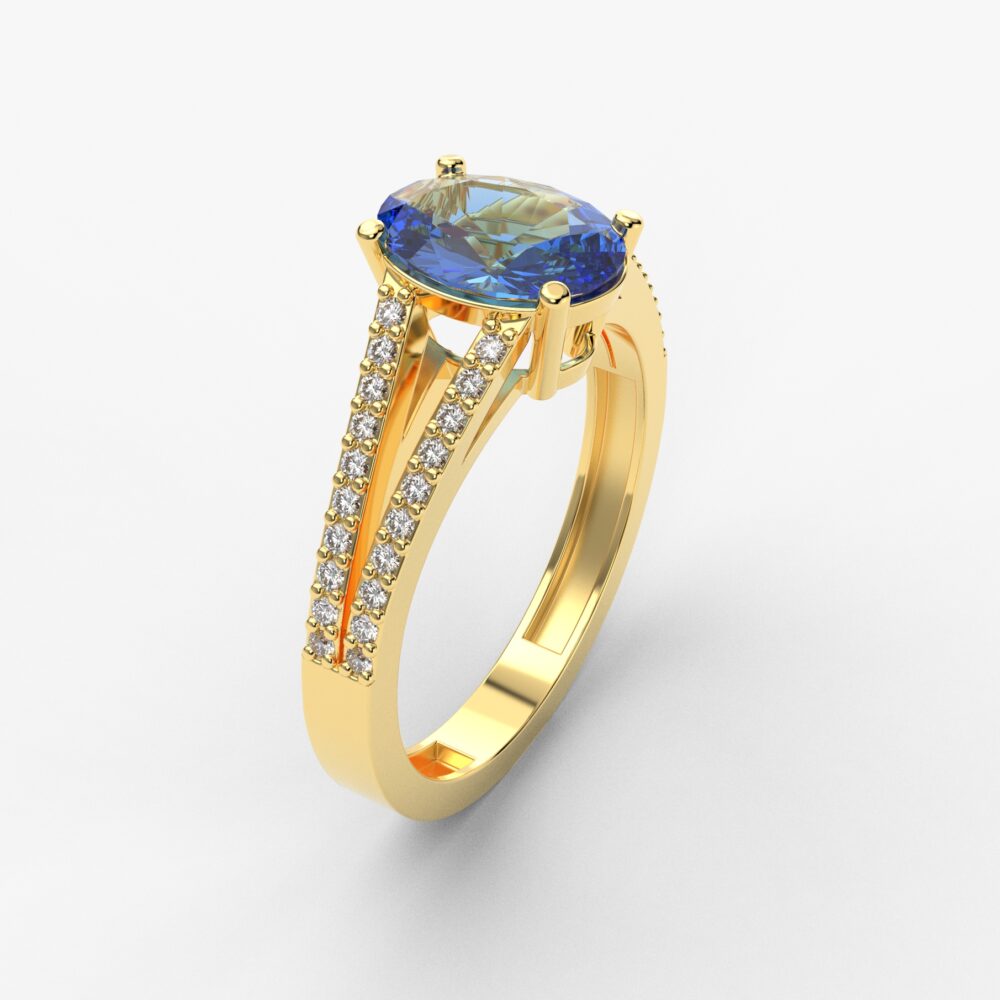 Prsten model 96 od žutog zlata sa plavim topazom i brilijantima