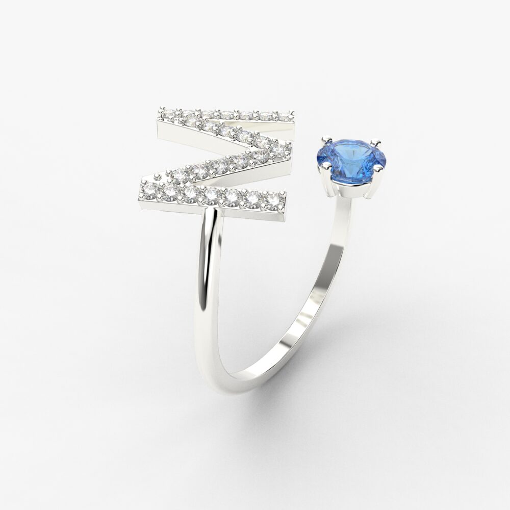 Prsten model 99 od belog zlata sa safirom i brilijantima