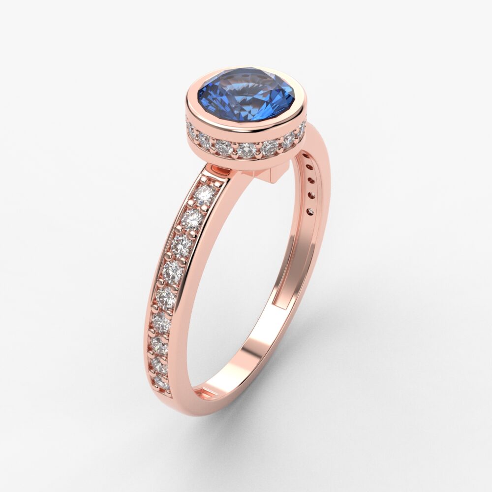 Prsten model 104 od roze zlata sa plavim topazom i brilijantima