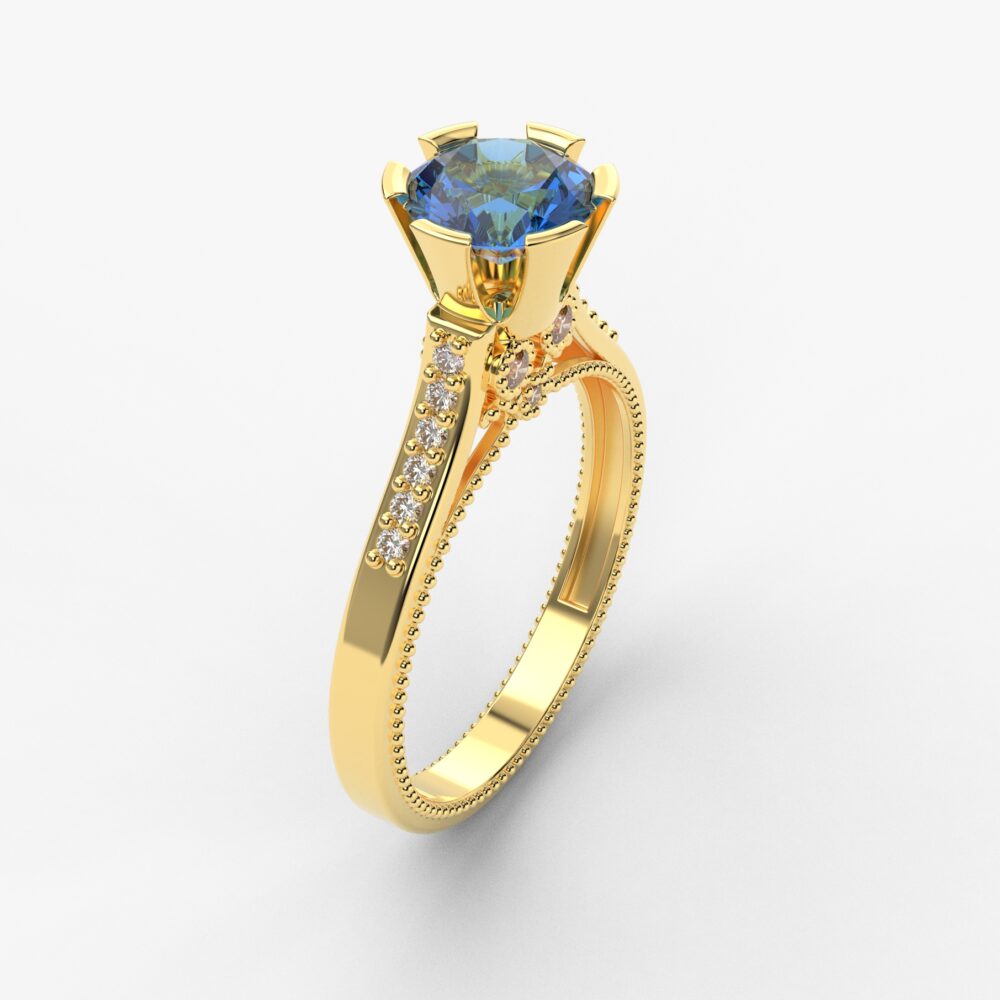 Prsten model 105 od žutog zlata sa safirom i brilijantima