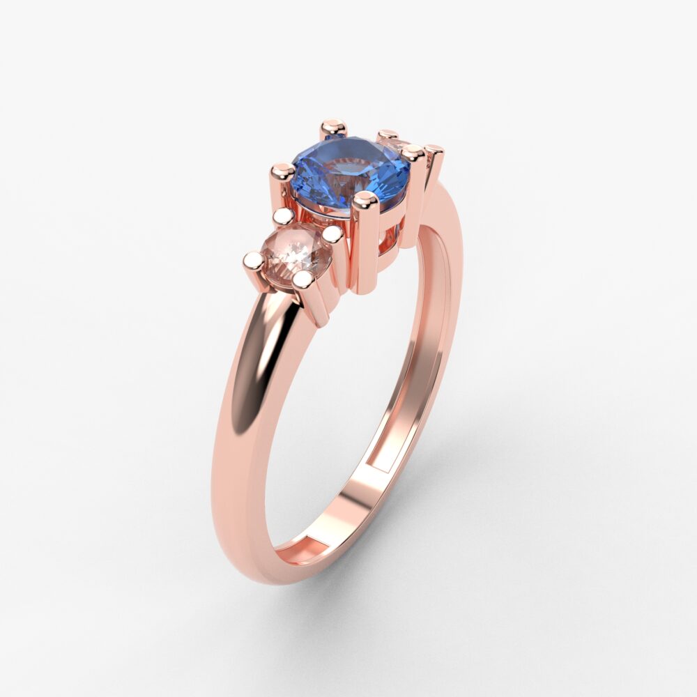 Prsten model 107 od roze zlata sa plavim topazom i brilijantima