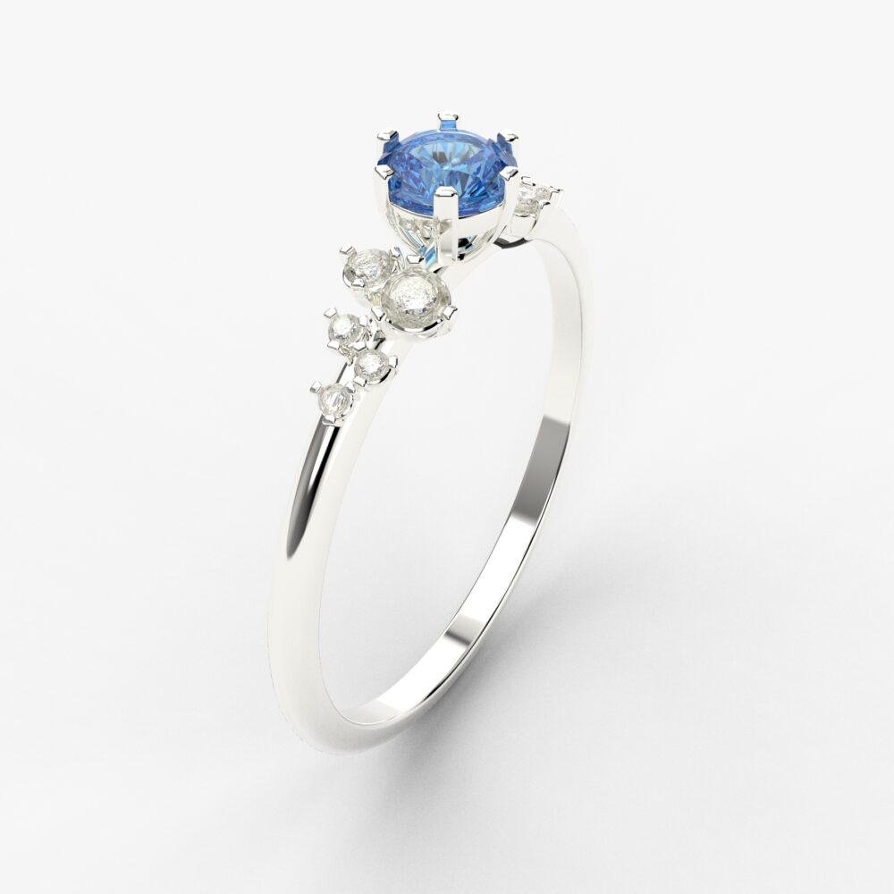 Prsten model 109 od belog zlata sa safirom i brilijantima