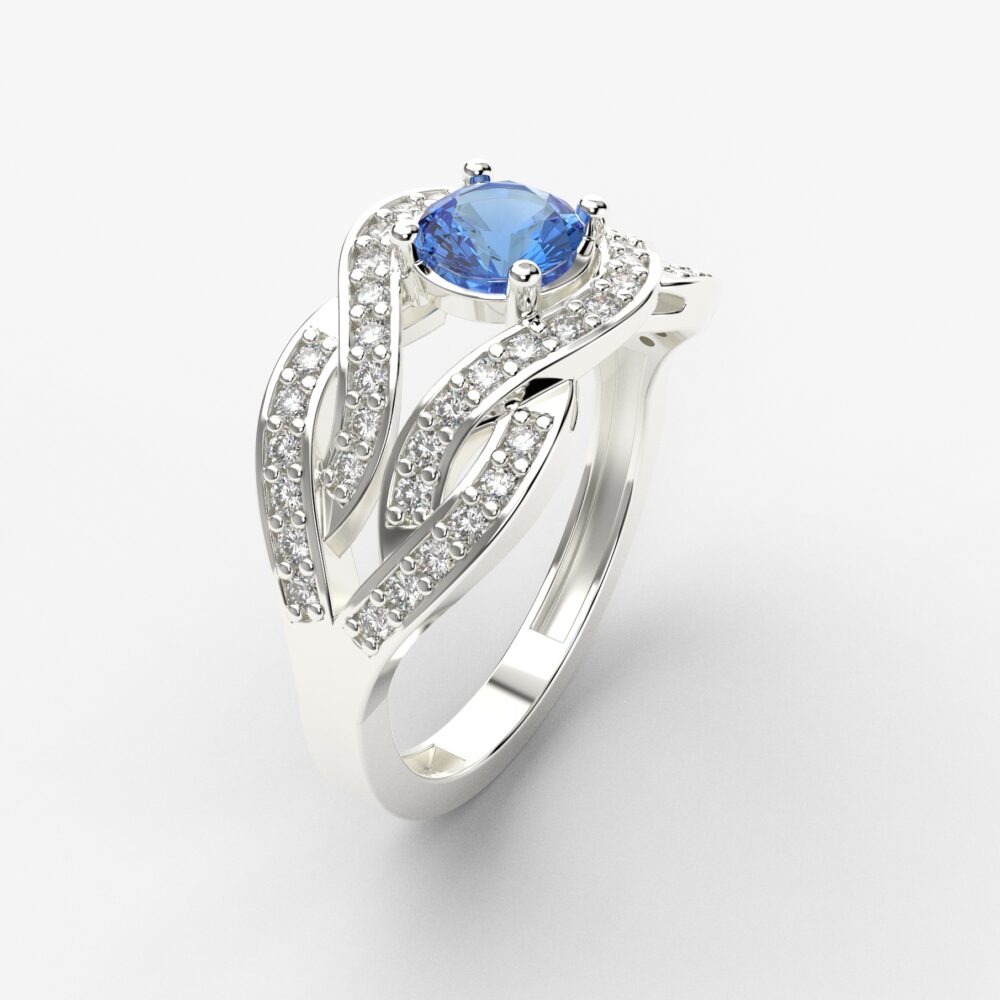 Prsten model 110 od belog zlata sa plavim topazom i brilijantima