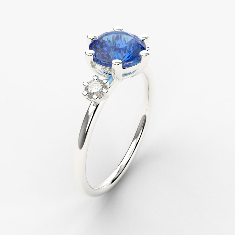 Prsten model 127 od belog zlata sa safirom i cirkonima