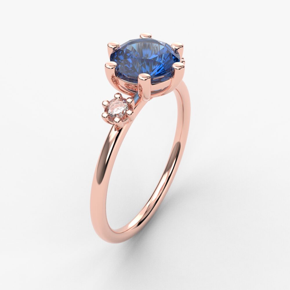 Prsten model 127 od roze zlata sa safirom i cirkonima