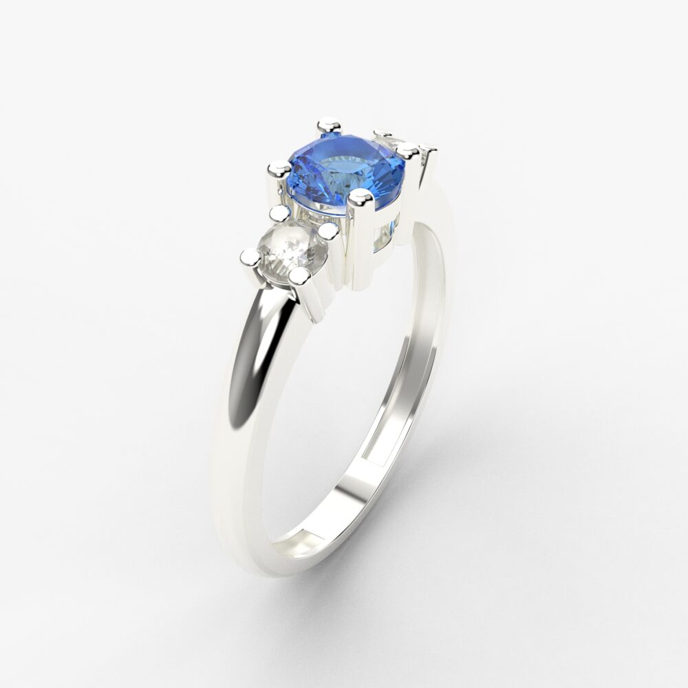 Prsten model 107 od belog zlata sa plavim topazom i brilijantima